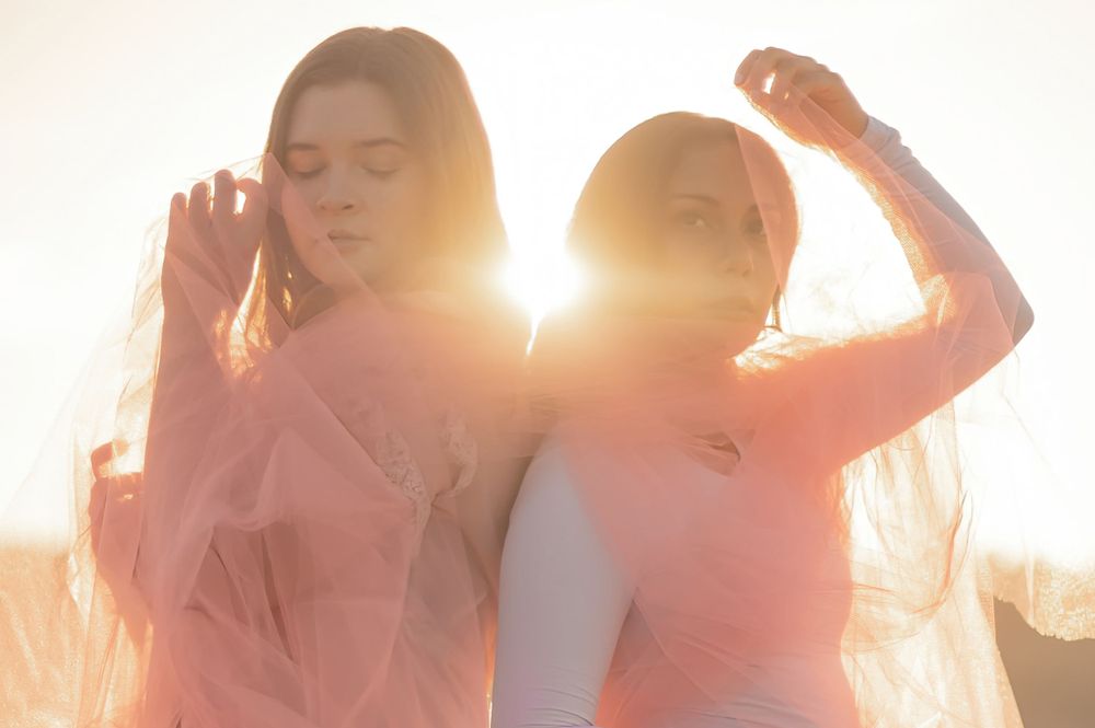 A creative golden hour photoshoot taken with tulle in Spokane Washington by Jessica Rae Photography.