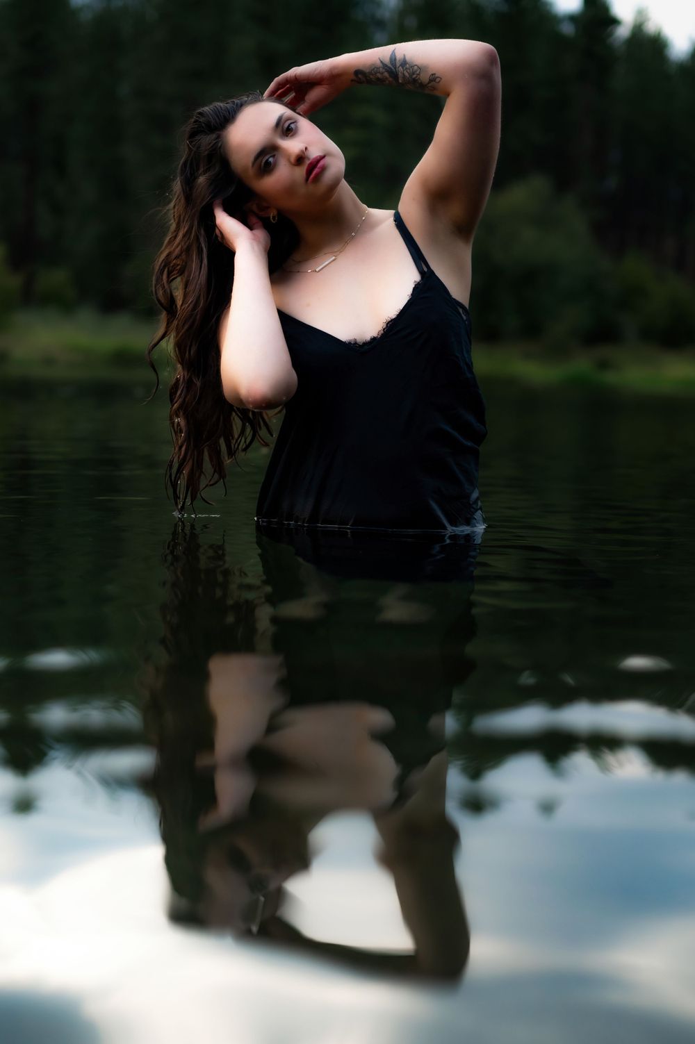 A water themed photoshoot take in the summer in the Spokane River in Spokane Washington by Jessica Rae Photography.
