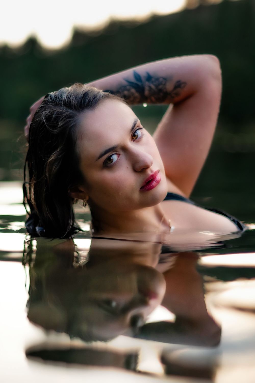 A water themed photoshoot take in the summer in the Spokane River in Spokane Washington by Jessica Rae Photography.