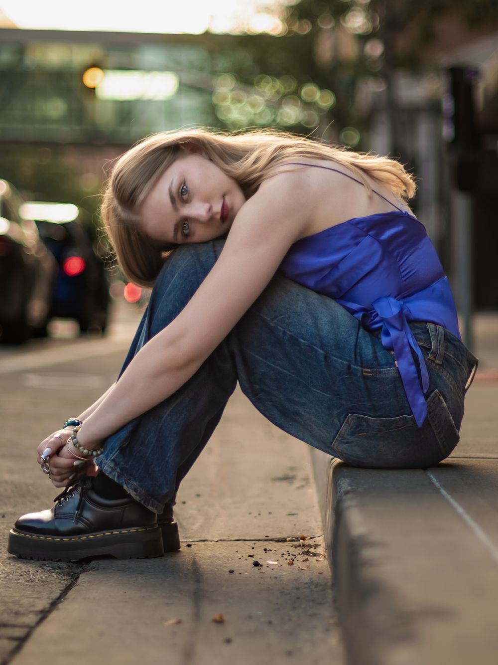 A high school senior during a portrait photoshoot in downtown Spokane Washington. By Jessica Rae Photography.