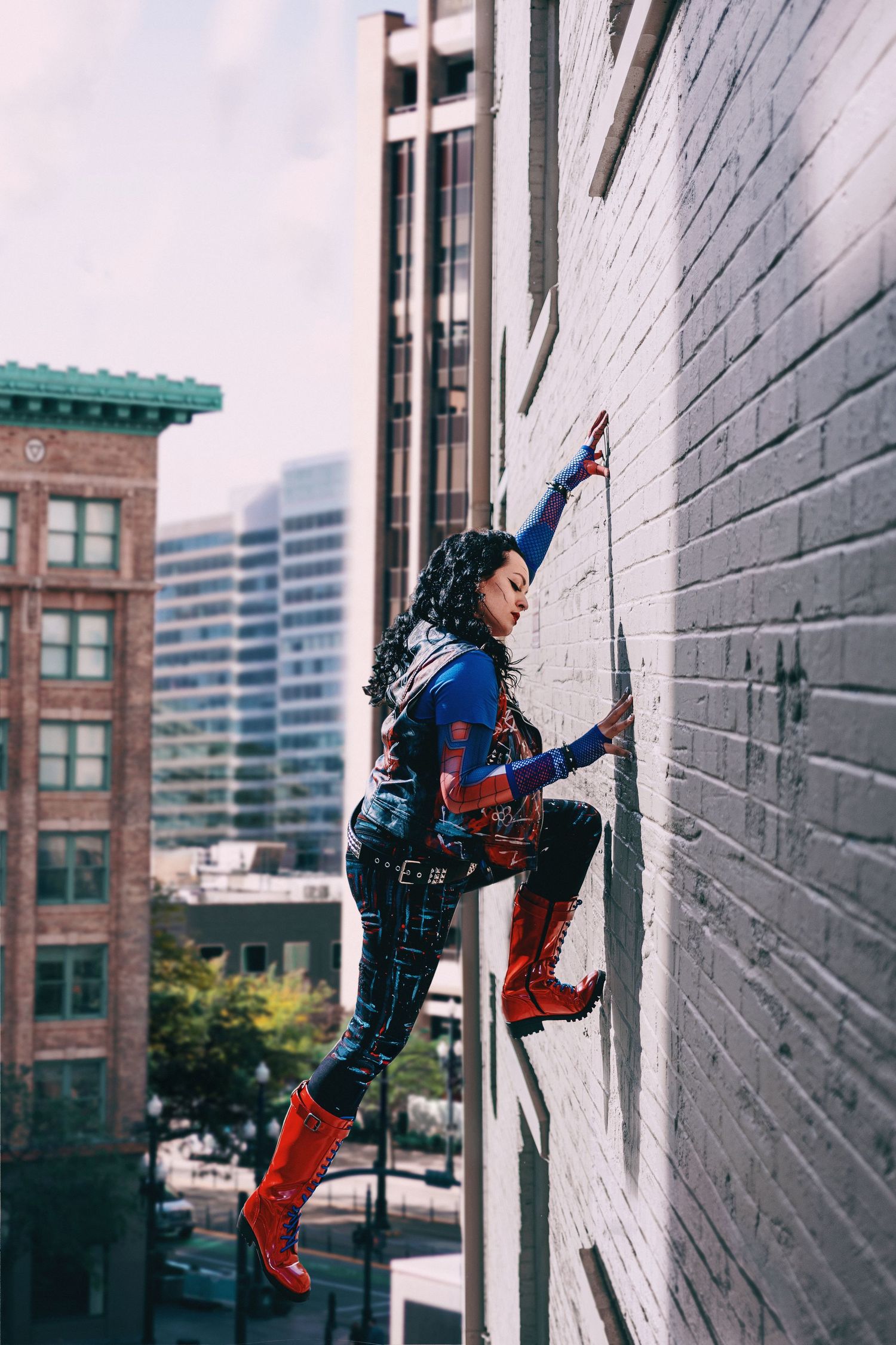 spider punk climbs wall the exchange place salt lake city utah