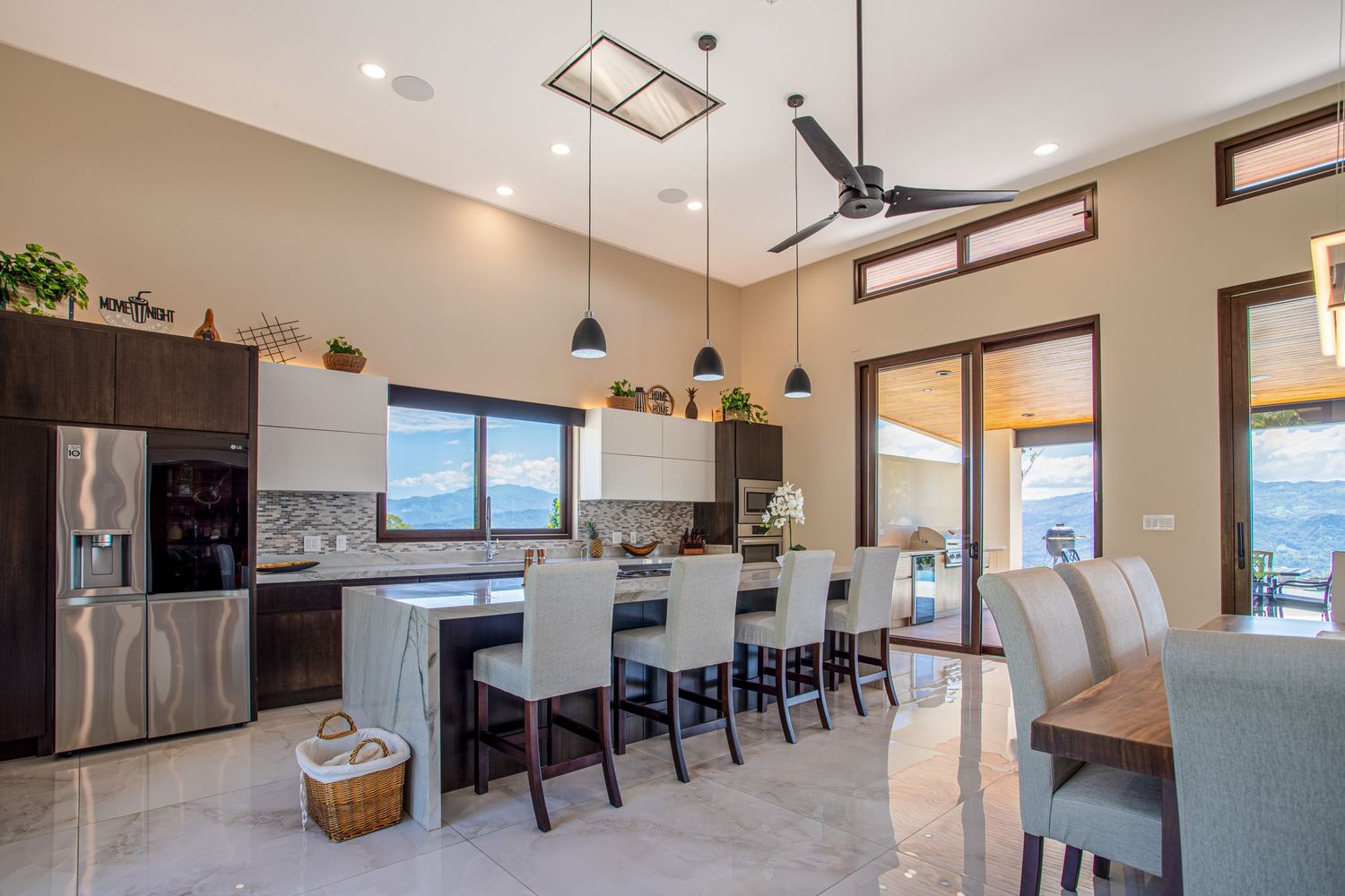 Luxury home exterior featuring modern architecture and a lush tropical setting in Costa Rica.