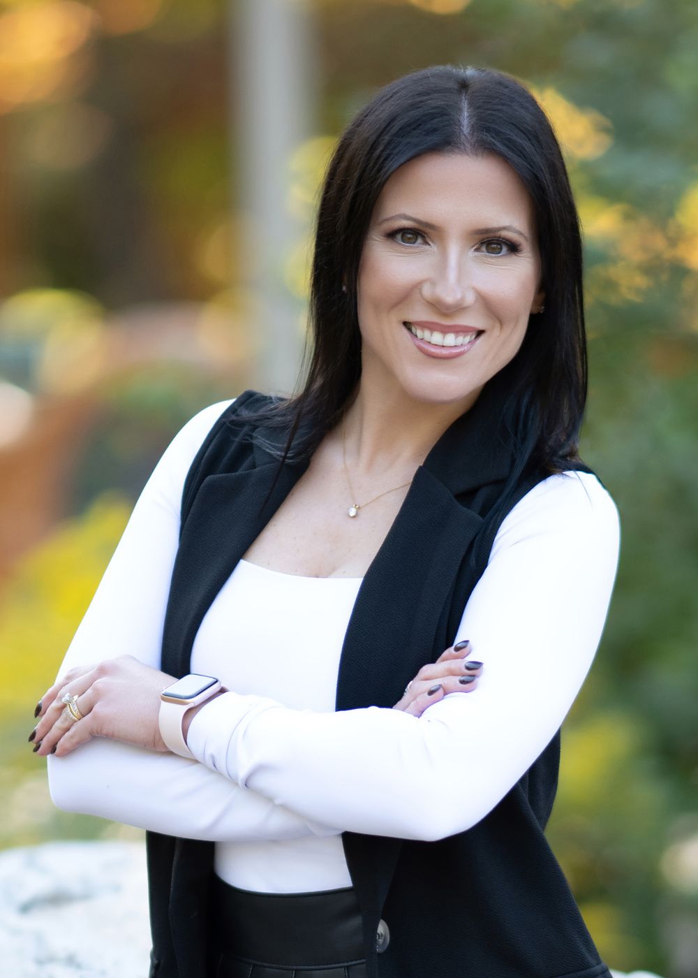 Professional portrait series in outdoor setting against blurred natural background with autumn colors and bokeh lighting effects.