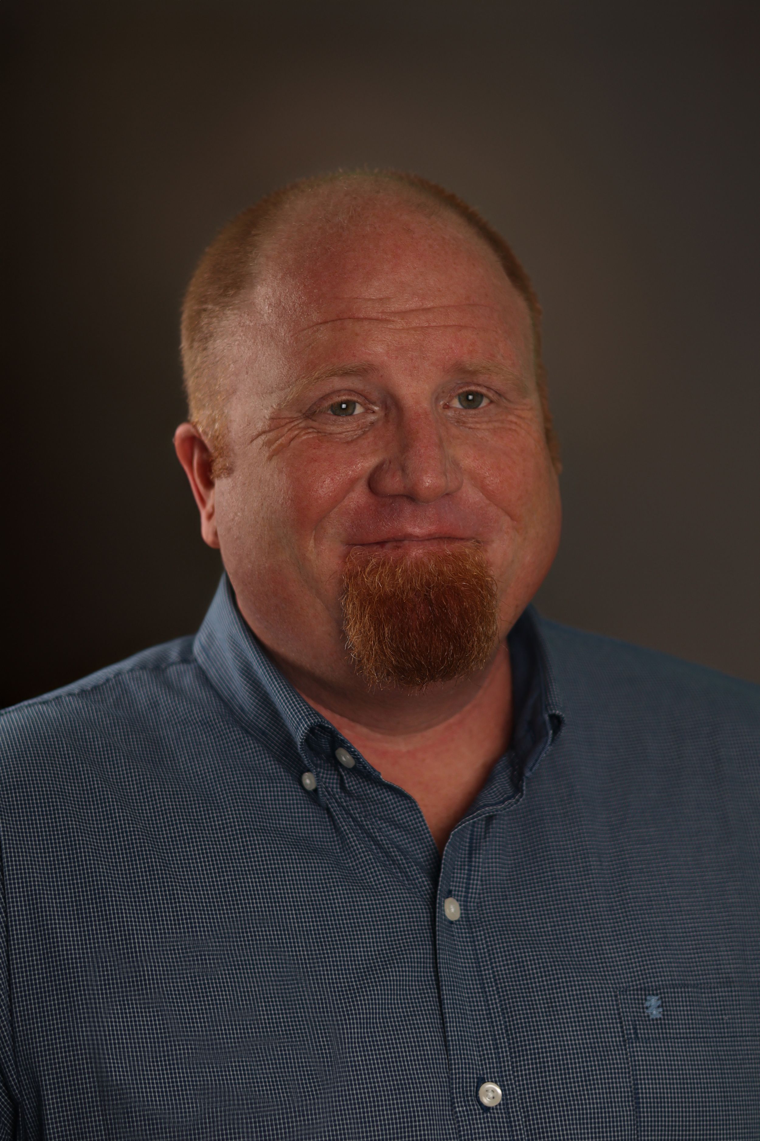 Headshot photographer Tampa, Florida.   Male photograph with a dark grey image.