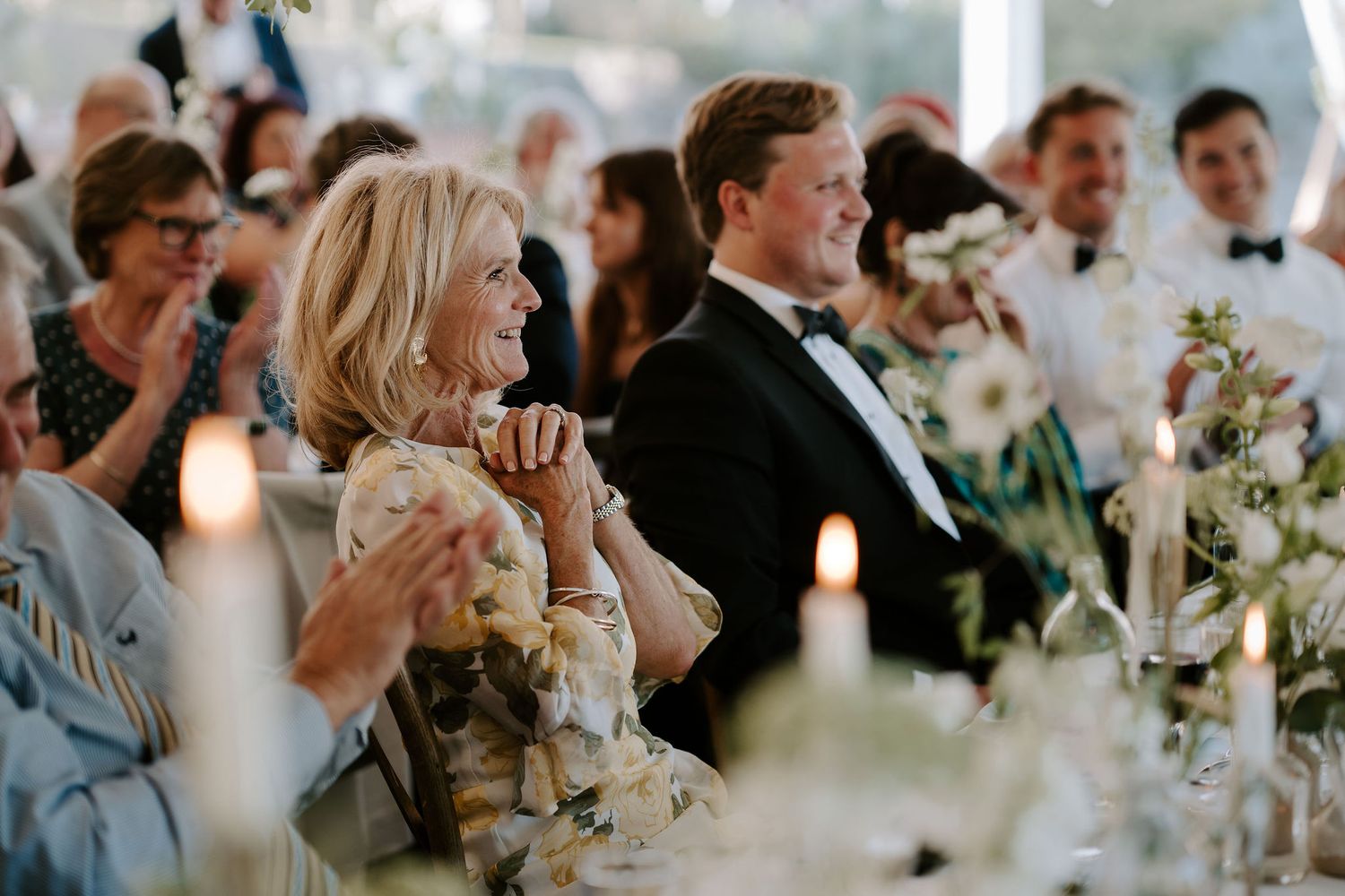 wedding guests enjoying father of brides speech at hamswell house wedding in bath