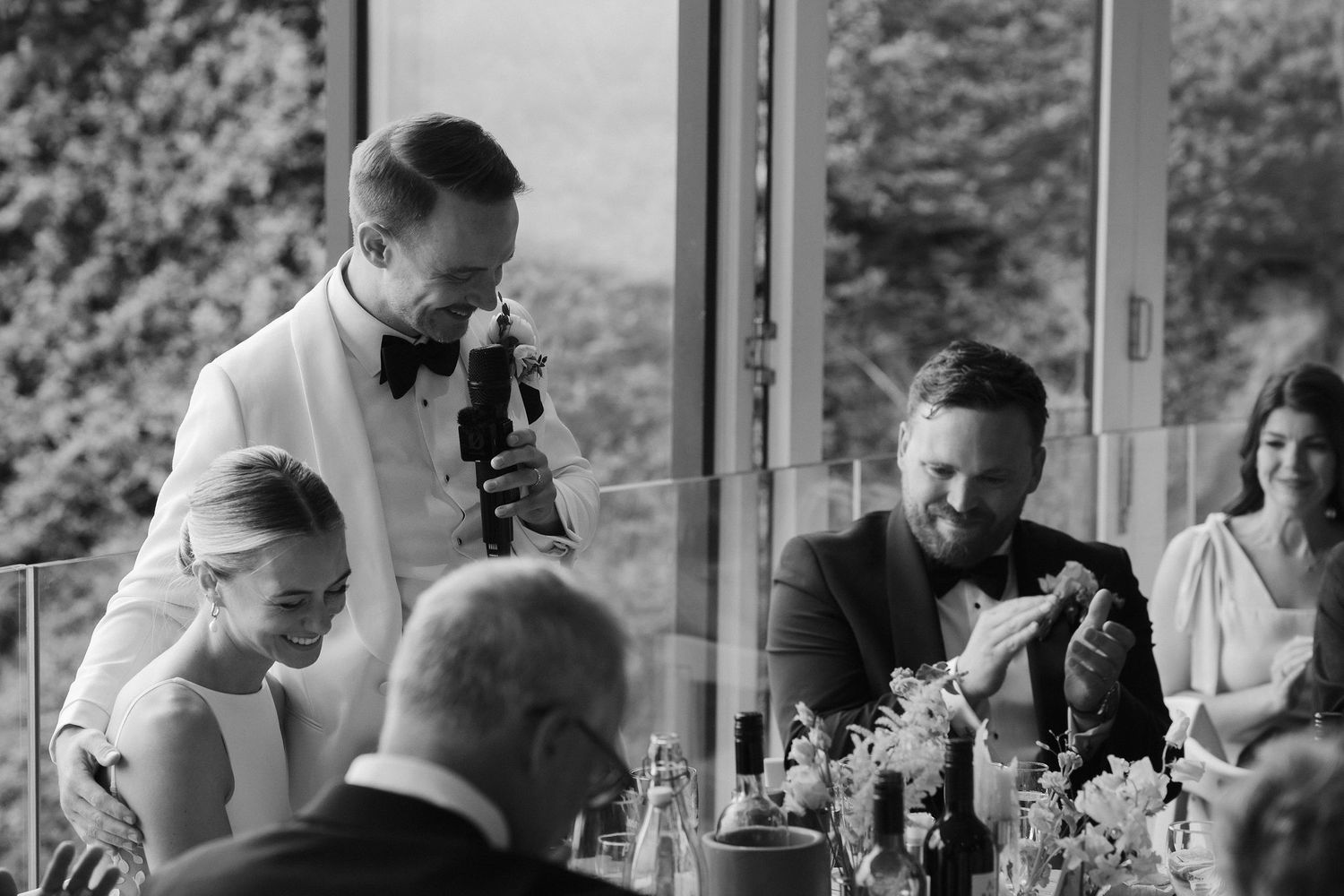 Groom giving speech at Tunnels Beach wedding venue in north devon
