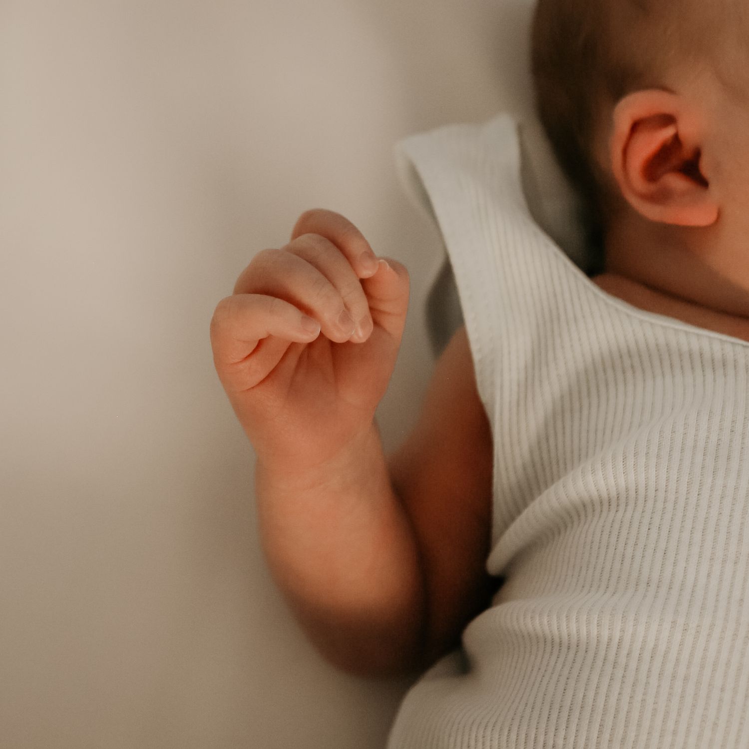 Small hands in a newborn hospital session