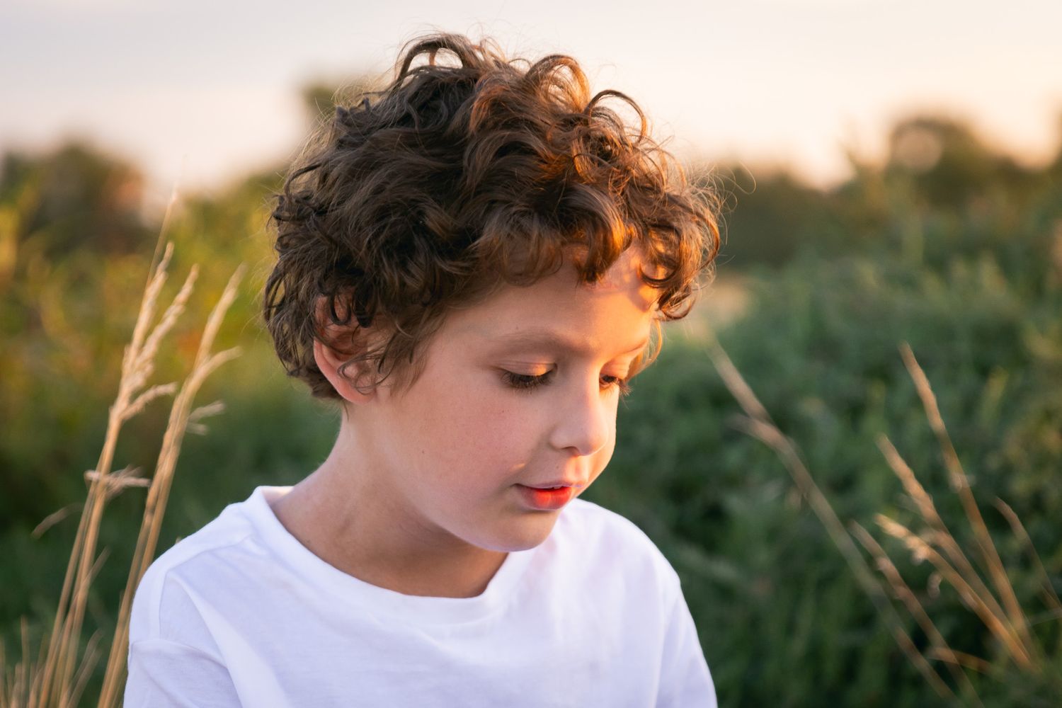 Kids portraits in nature by Nikolina Photography.