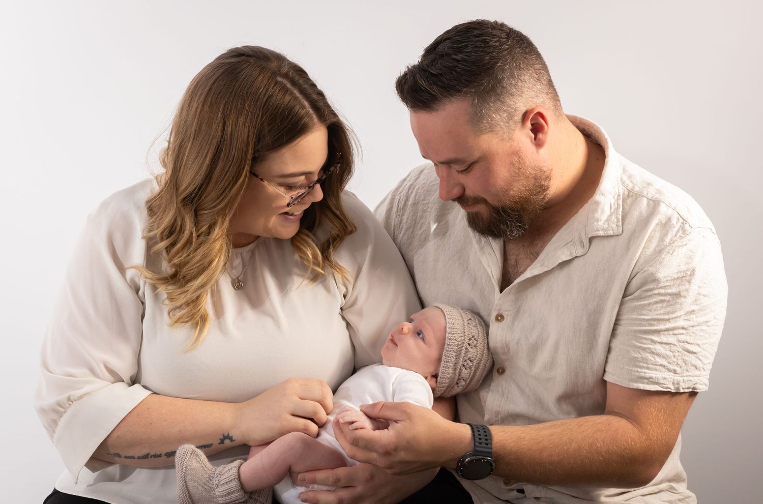 Family newborn photoshoot in the studio by Nikolina Photography.