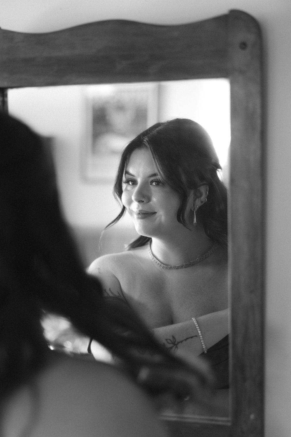 A series of black and white artistic portrait shots showing contemplative expressions and reflective moments.