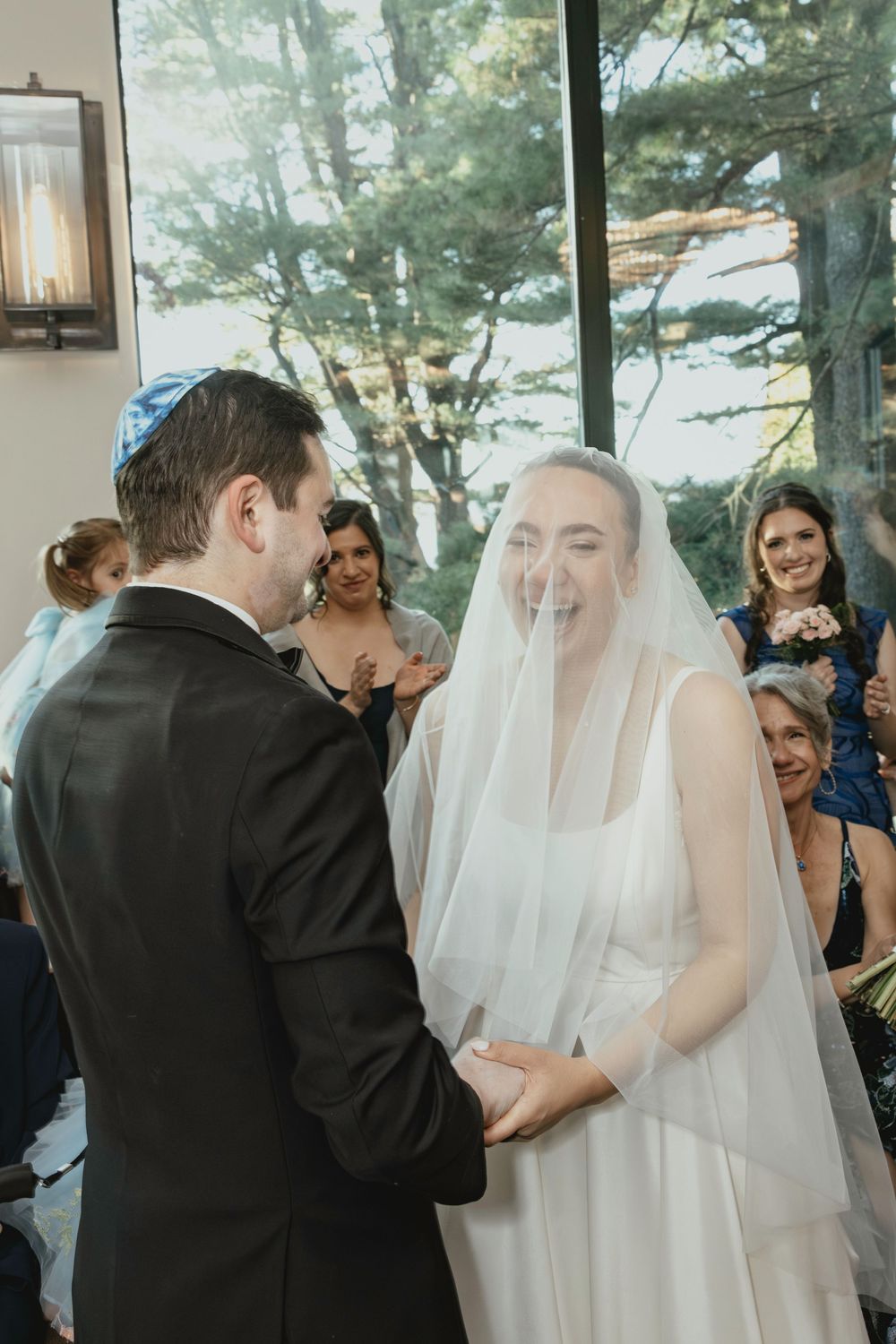 A series of intimate moments during a wedding ceremony showing the couple exchanging vows.