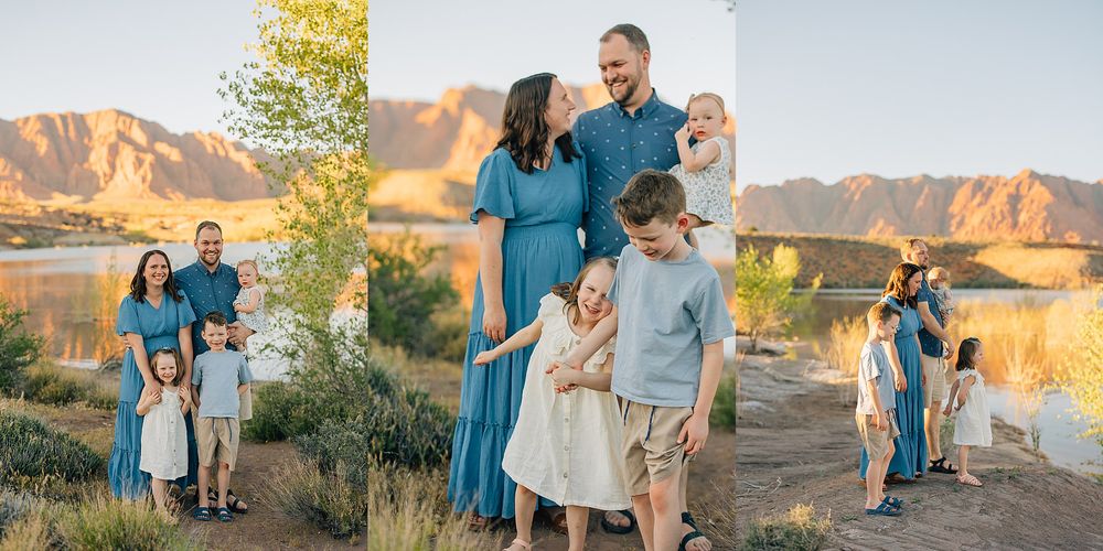 Family portrait session near a mountain lake at golden hour, parents with three young children in coordinating blue and white outfits.