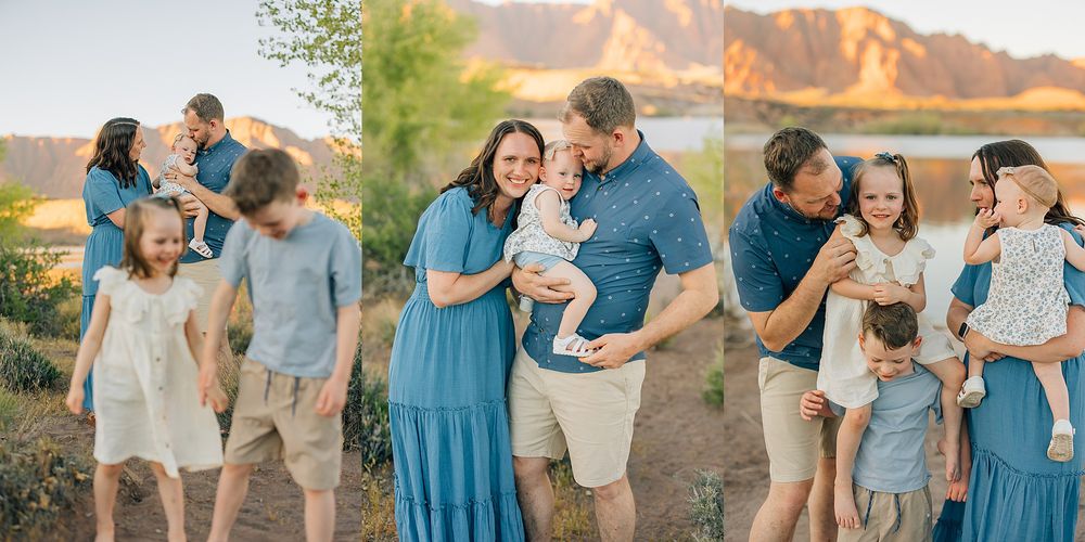Family of five poses outdoors near a lake at golden hour, wearing coordinated blue and neutral tones.