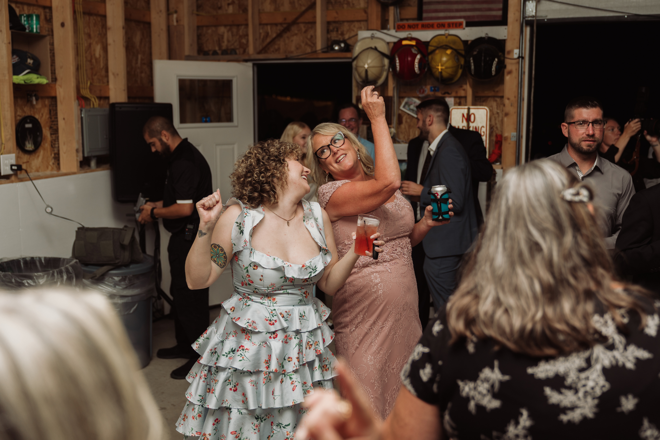 Wedding guests dancing during reception celebration