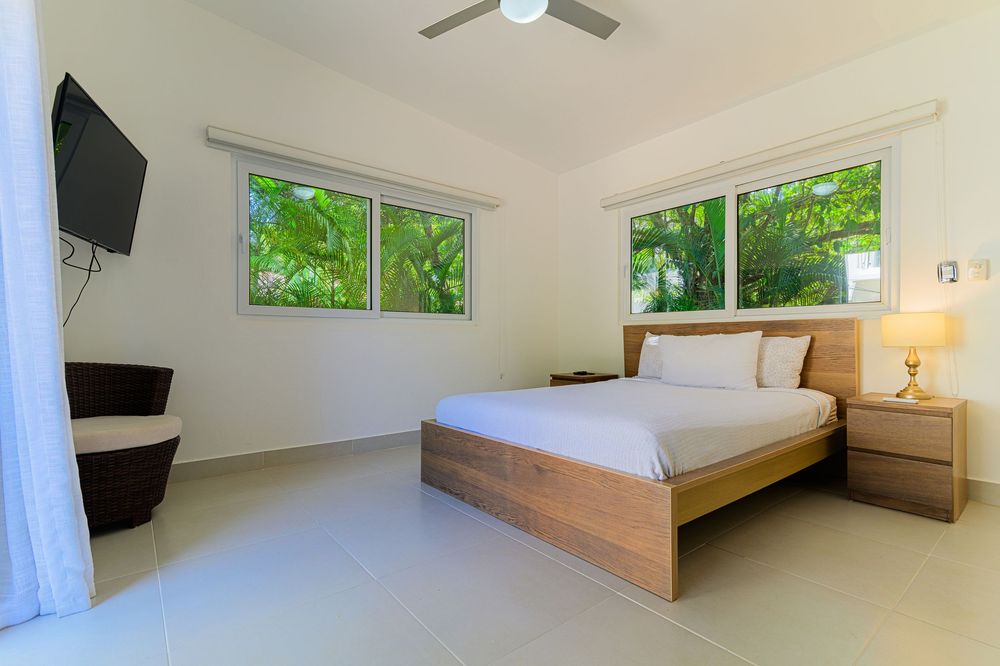 Luxury 3-level villa in Sosua with 2 kitchens, 3 guest bathrooms, and custom midnight blue infinity pool.