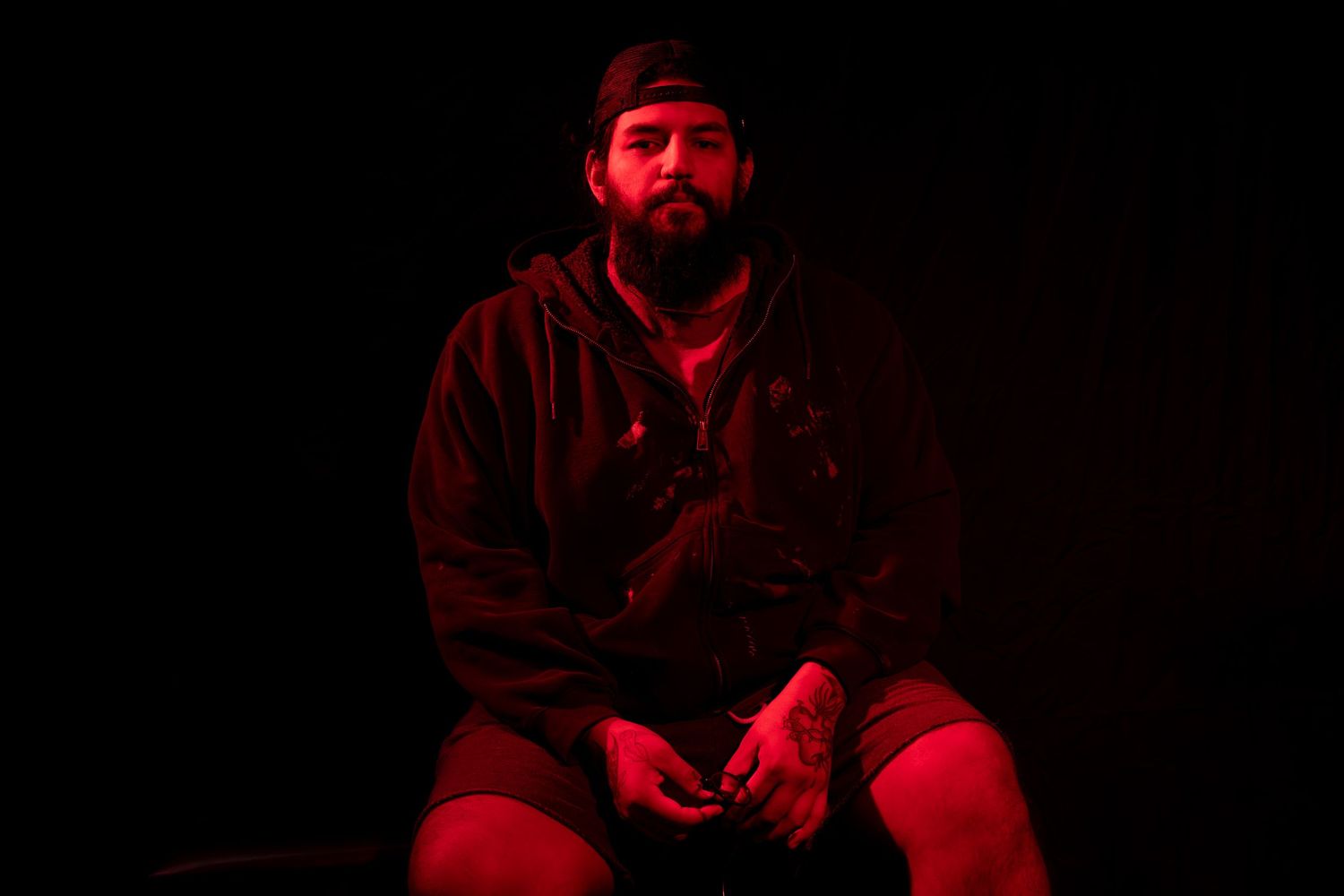 Dark and moody portrait of King using only Red lighting