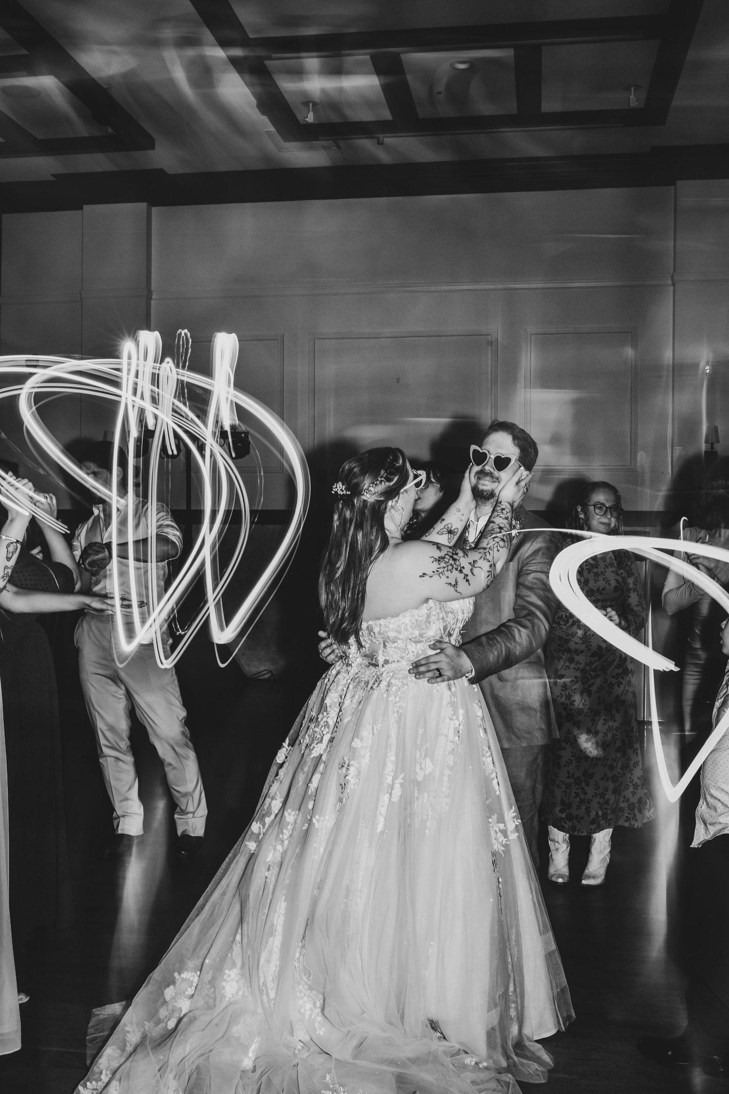 High-energy editorial dance floor moments with live DJ entertainment at winter wedding