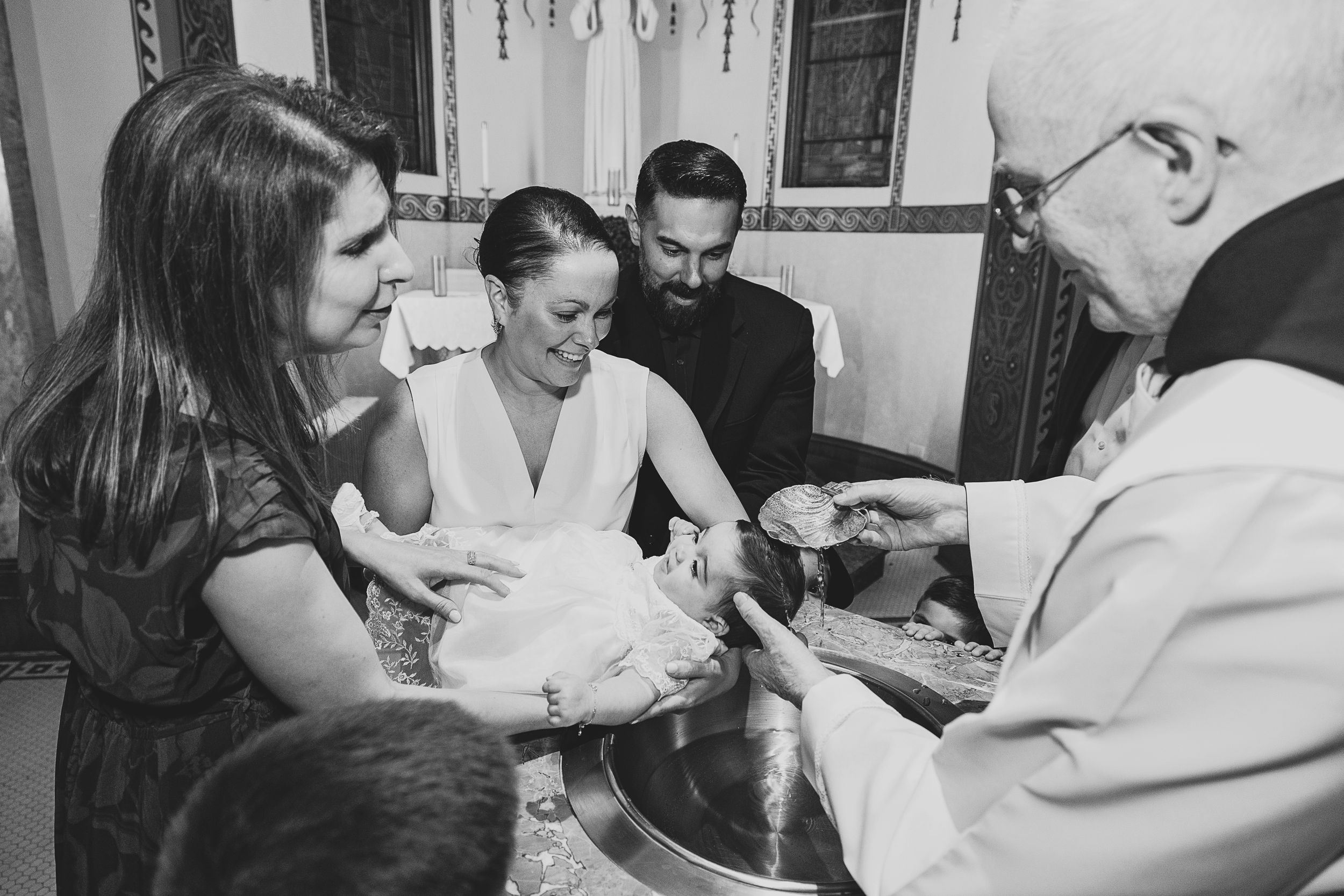 Black and white photos of religious ceremony or blessing taking place indoors.