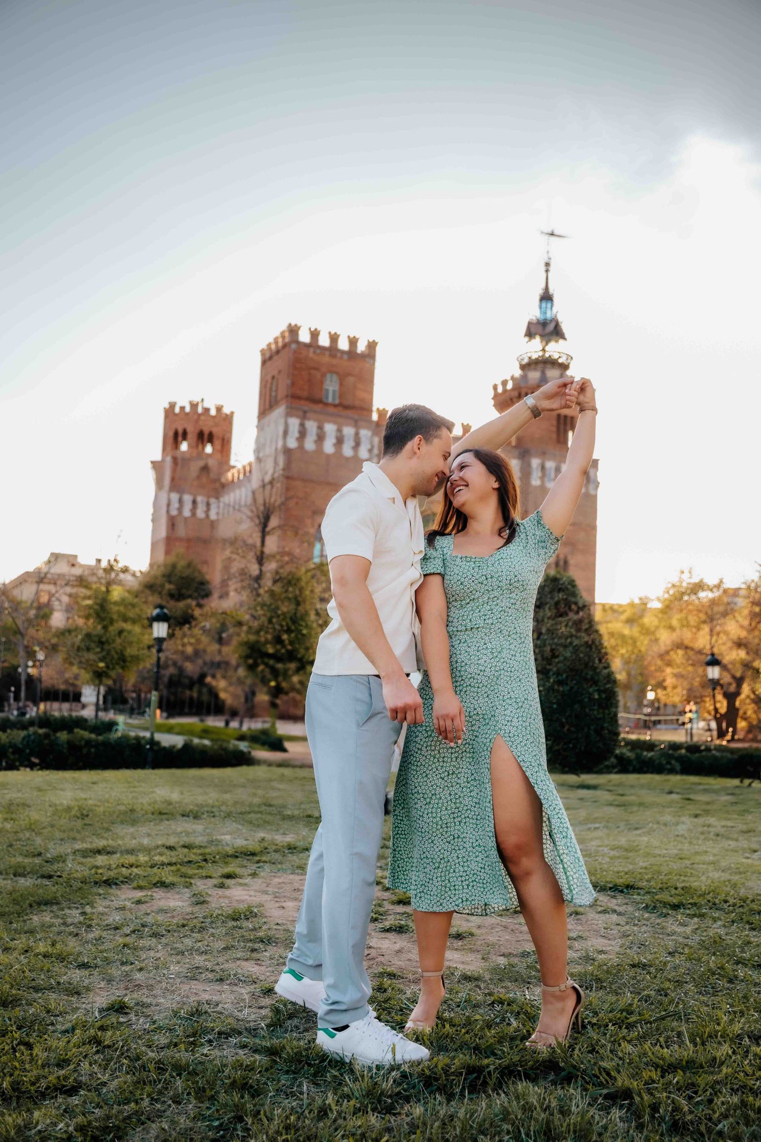 Stylish couple outfits for autumn engagement photoshoot.