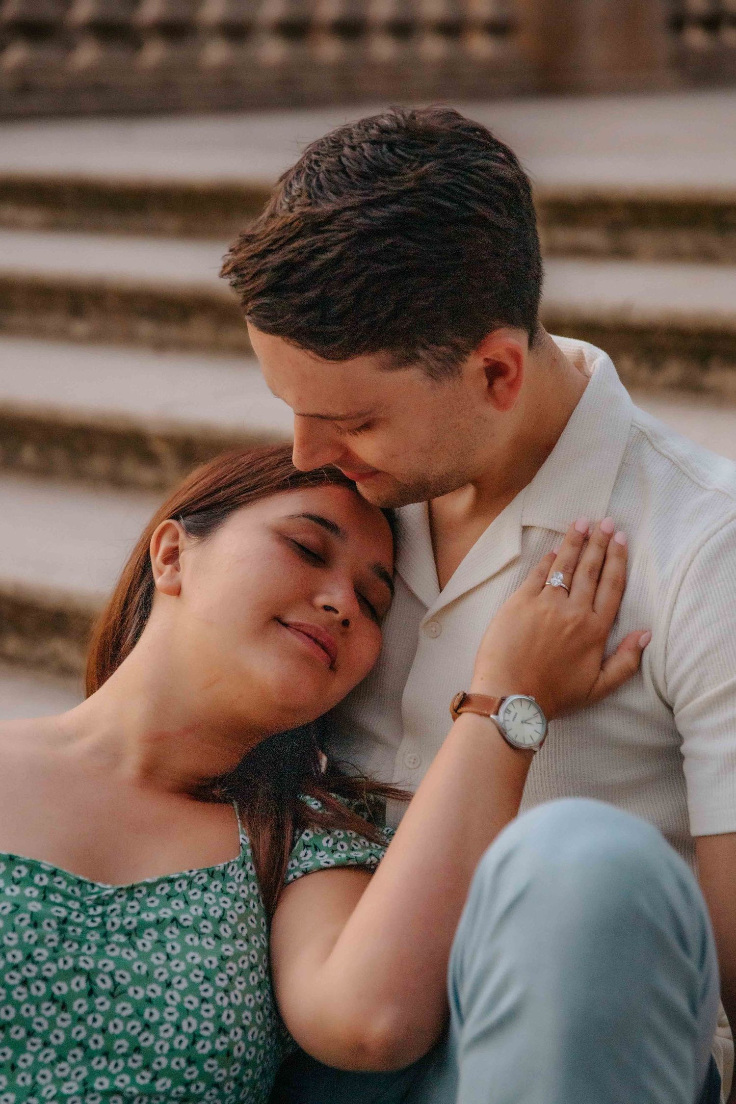 Chloe and Markus holding hands in a quiet corner of Ciutadella Park Barcelona.