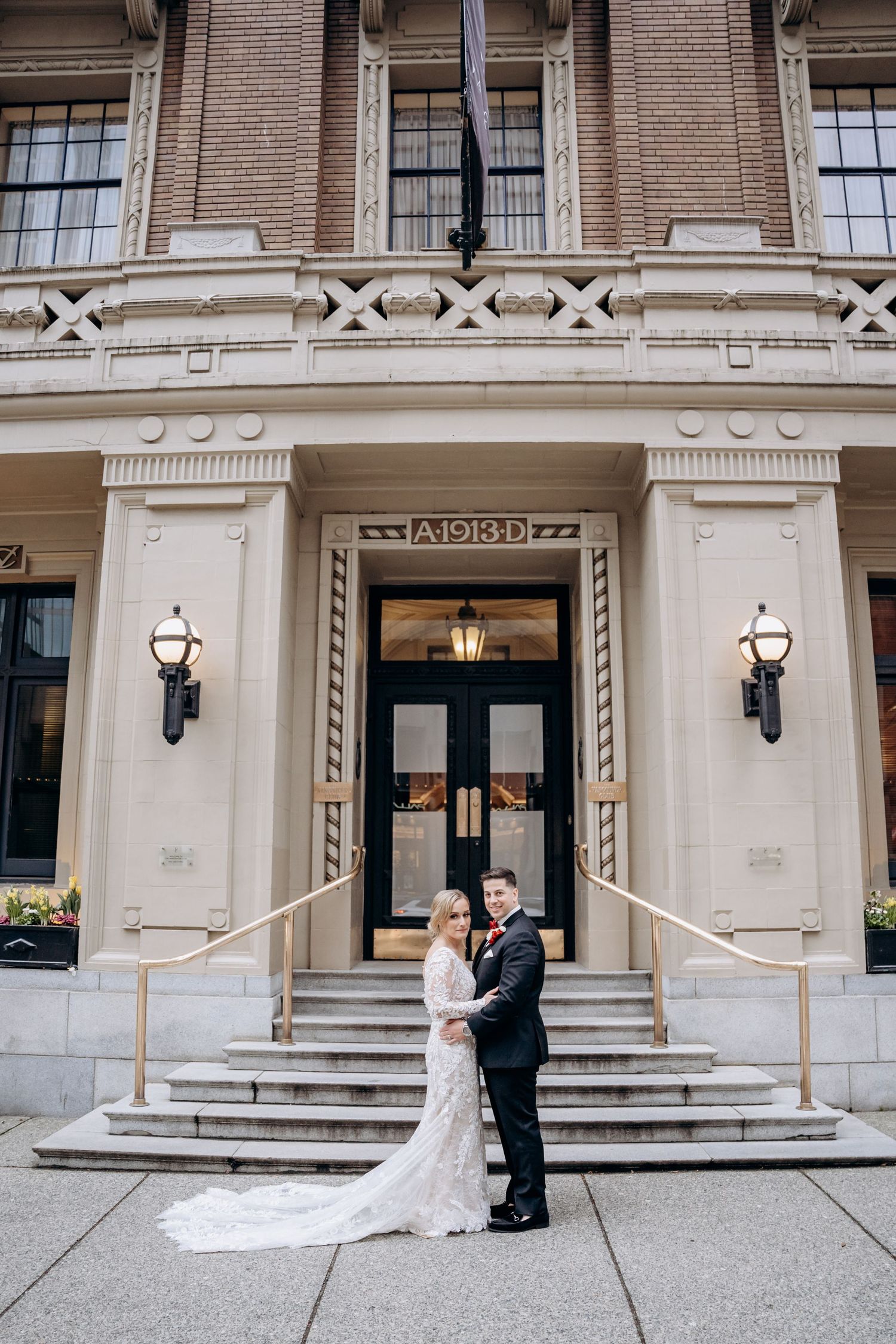 Classic stone building exterior with ornate architectural details and grand entrance steps.