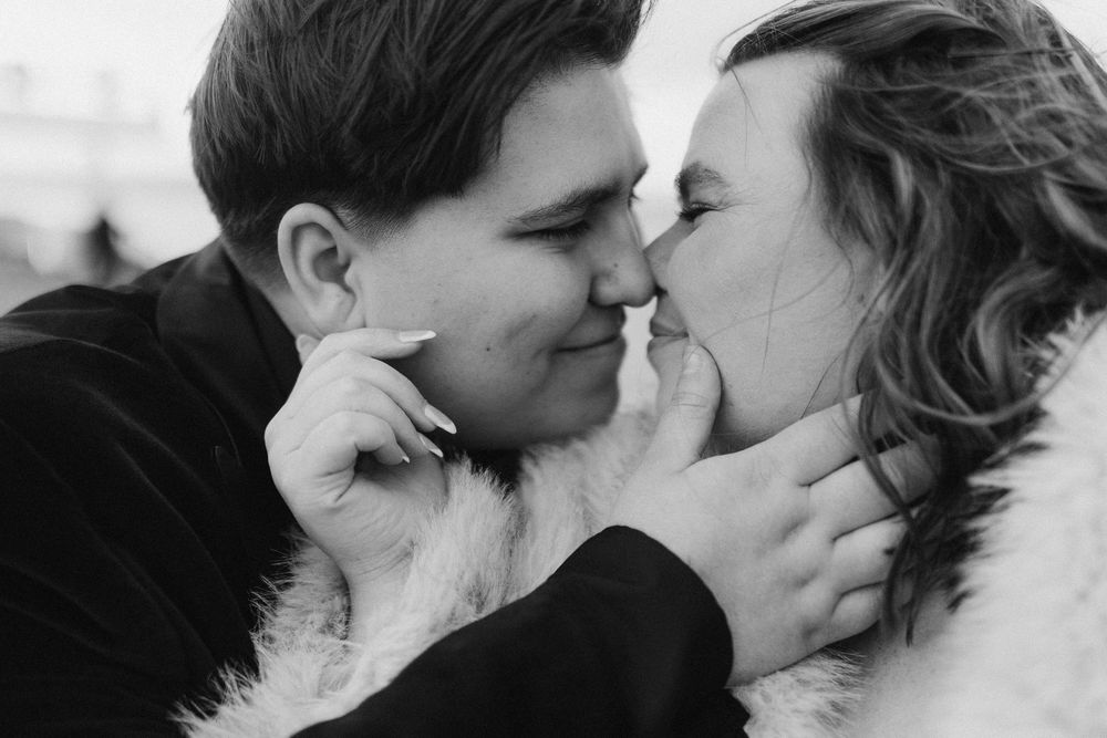 A series of black and white romantic photographs showing intimate kissing moments between couples.