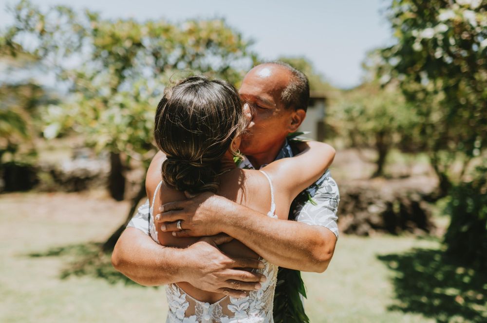 Emotional wedding ceremony moments captured in a series of candid embraces.