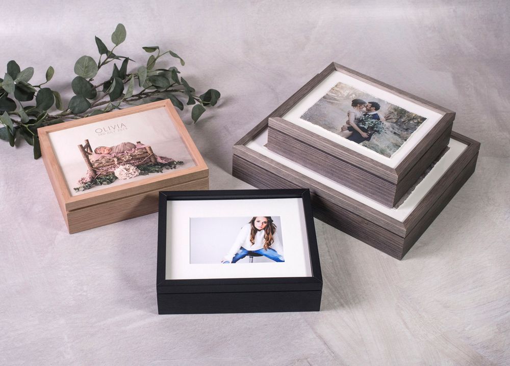 Custom matted print collection in a luxury display box for newborn memories.