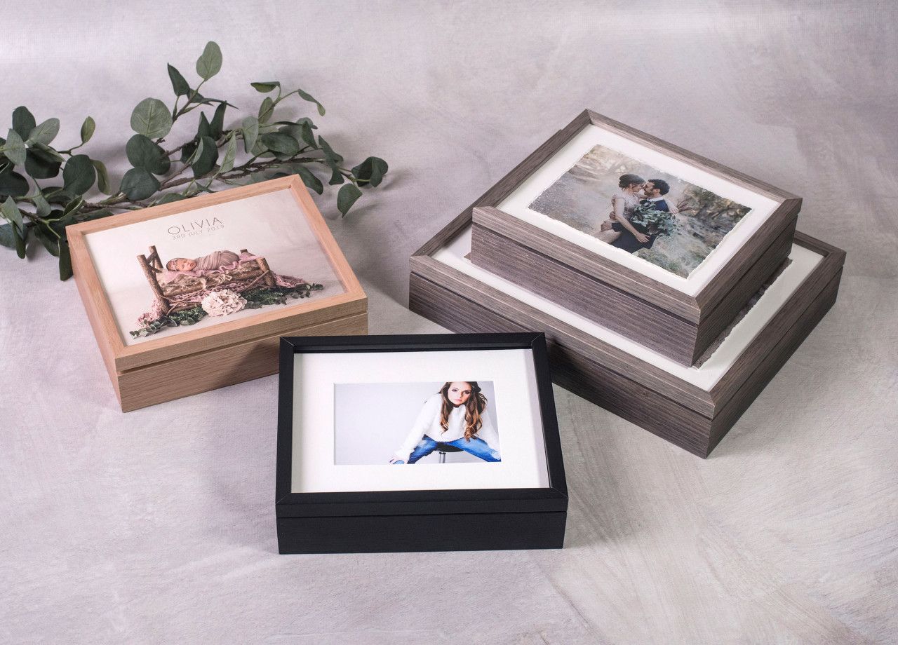 Custom matted print collection in a luxury display box for newborn memories.