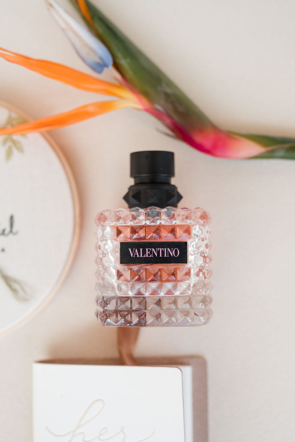 Perfume and wedding detail flat lay during bridal preparation