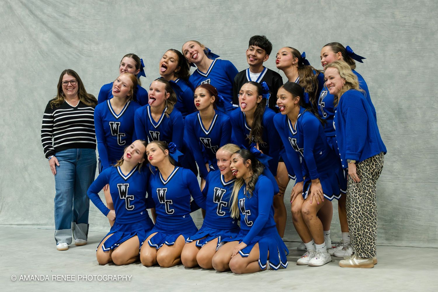 A cheerleading team in blue uniforms poses for a photo sequence showing different expressions and poses.
