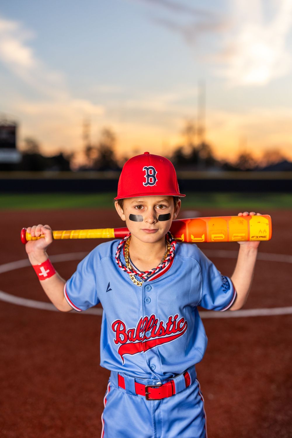 Youth baseball portrait using off-camera flash during a team media day in Lake Charles, LA. Ballistics at Westlake High School Field
