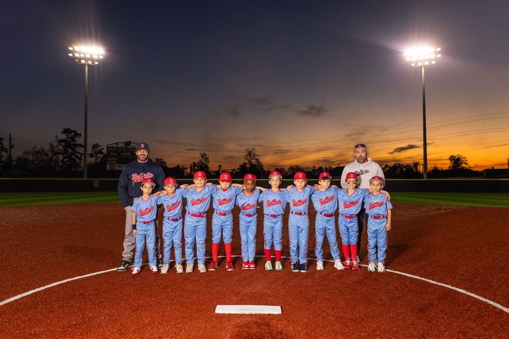 Youth baseball portrait using off-camera flash during a team media day in Lake Charles, LA. Ballistics at Westlake High School Field