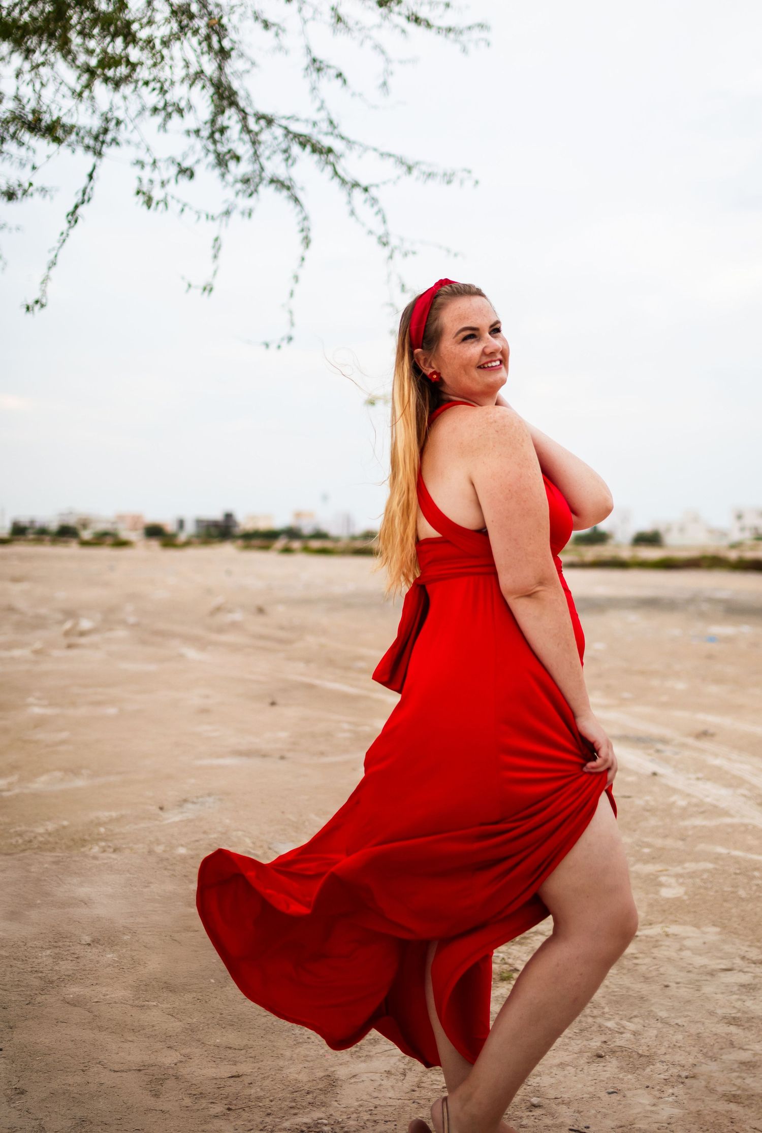 beach photoshoot in abu dhabi clinet closet options red dress