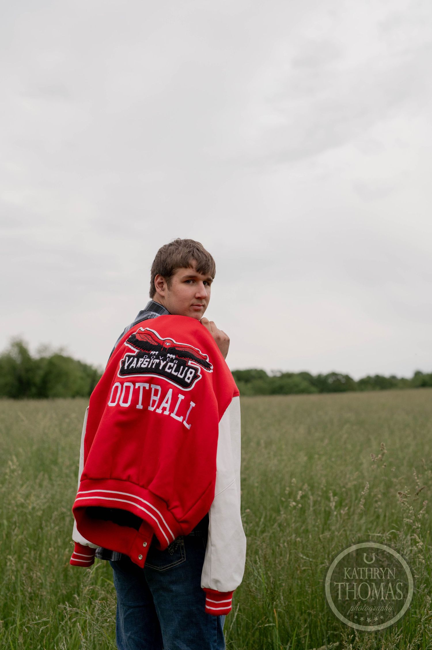 Three photos of someone in a red varsity letterman jacket standing in a grassy field against an overcast sky.