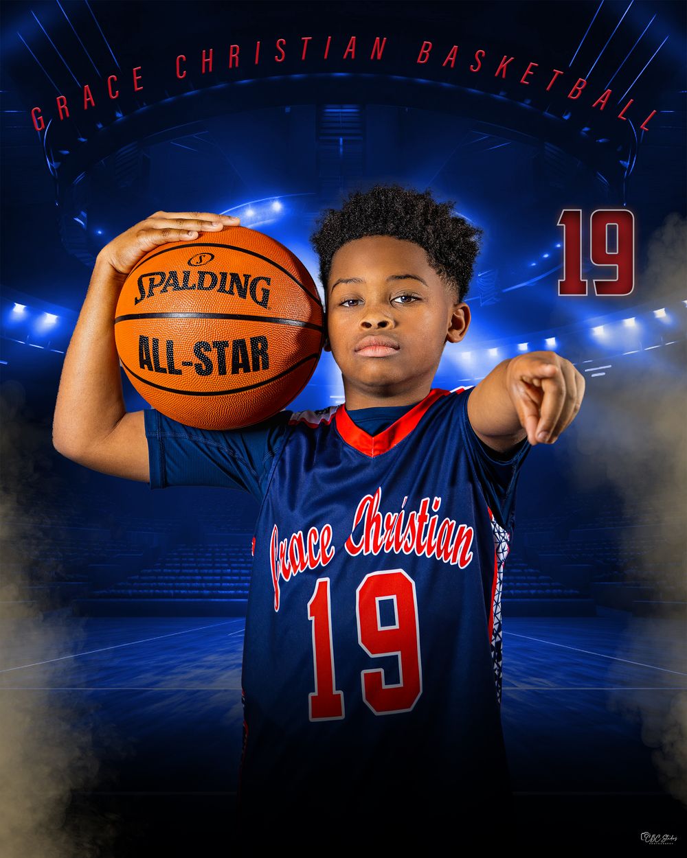 Young basketball player in Grace Christian jersey #19 poses with Spalding All-Star ball against blue stadium backdrop.