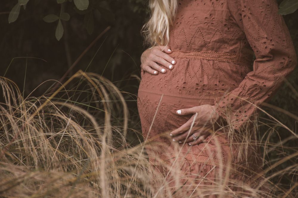 Waikato's premier maternity and newborn photographer: Enjoy a stress-free session with our free client wardrobe at Stay&