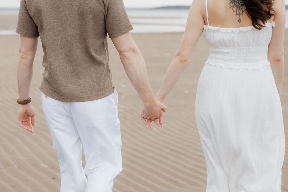 Couples beach engagement session Shediac NB Professional photographer romantic intimate moment photography film vibes soft elegant photos