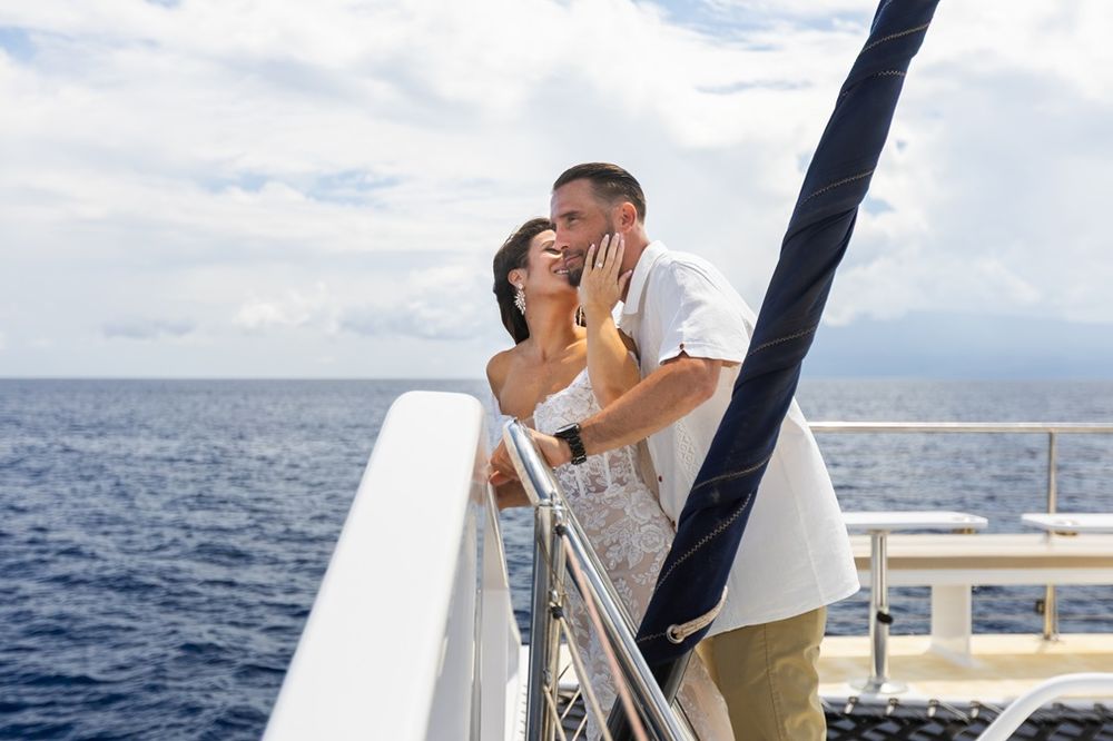 Wedding couple photo shoot during sail boat (Trilogy) ceremony on Maui Hawaii by ohwowfotos