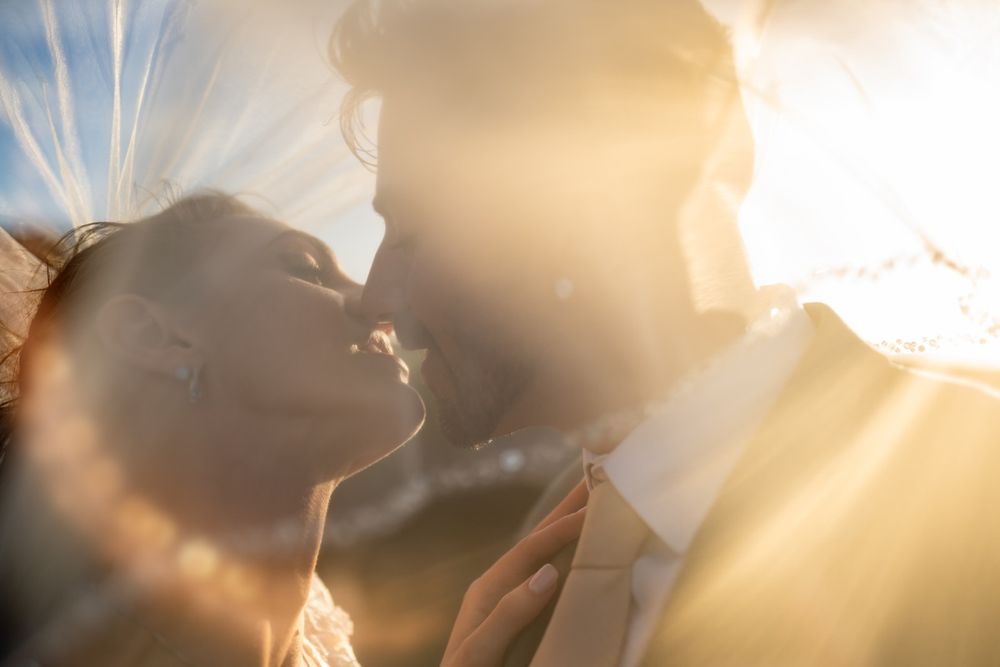 Wedding couple photo shoot during sunset beach on Maui Hawaii by ohwowfotos