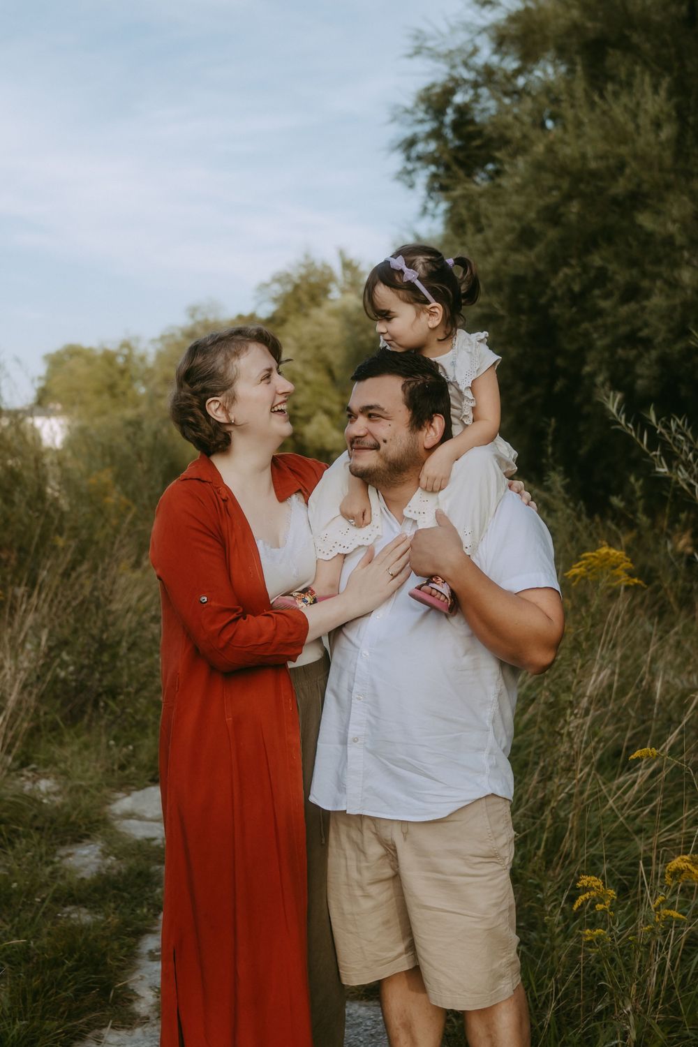 Playful moment between two people outdoors in natural setting.