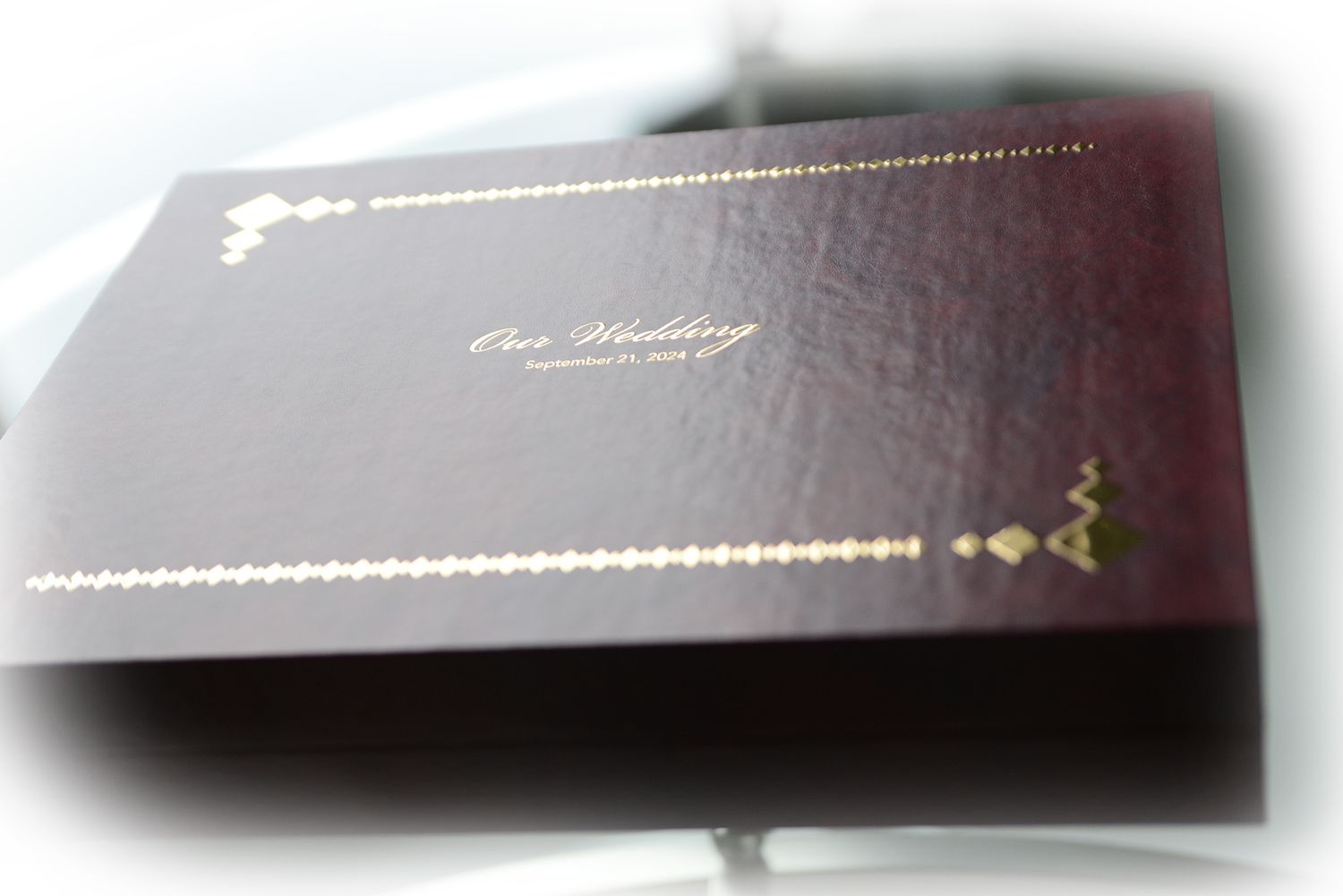 Wedding album book burgundy box with gold foil design by luba wold