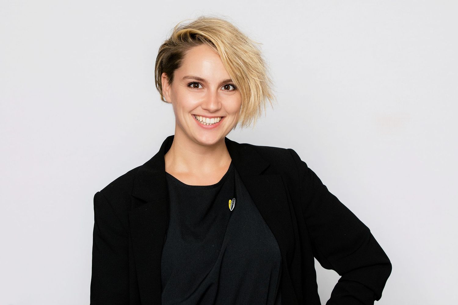 Professional headshot against white background.