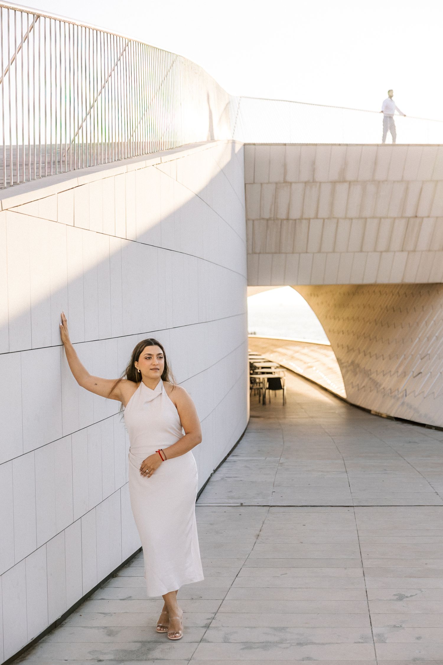 Cinematic sunrise engagement session at MAAT Lisbon. captured by destination wedding photographer in Portugal