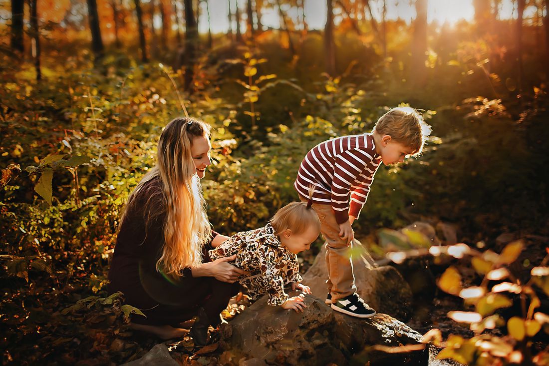 Family portrait among colorful leaves – Springfield Missouri family photographer.