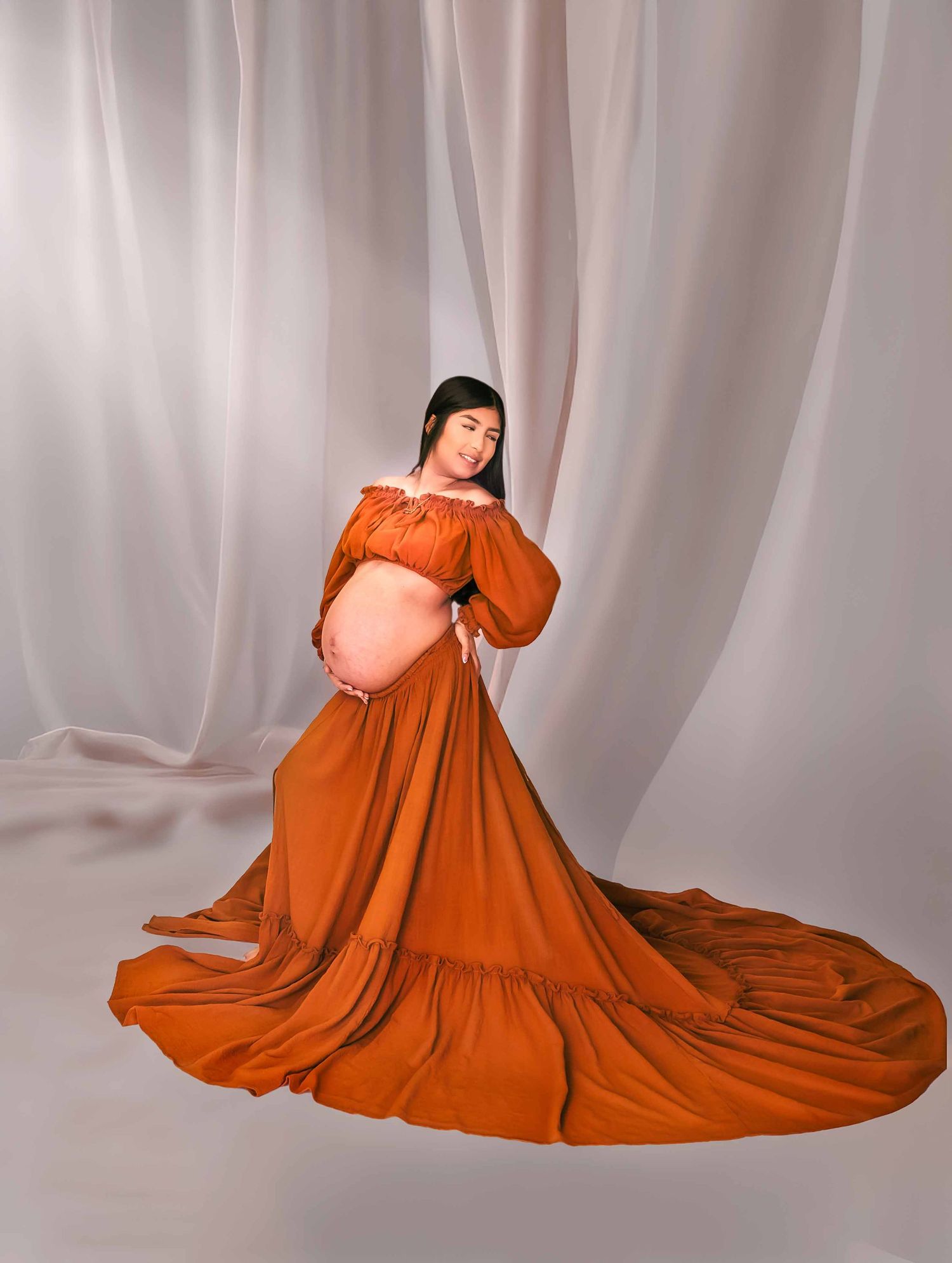 Clovis, Ca portrait photographer capturing father to be admiring the mother of his child