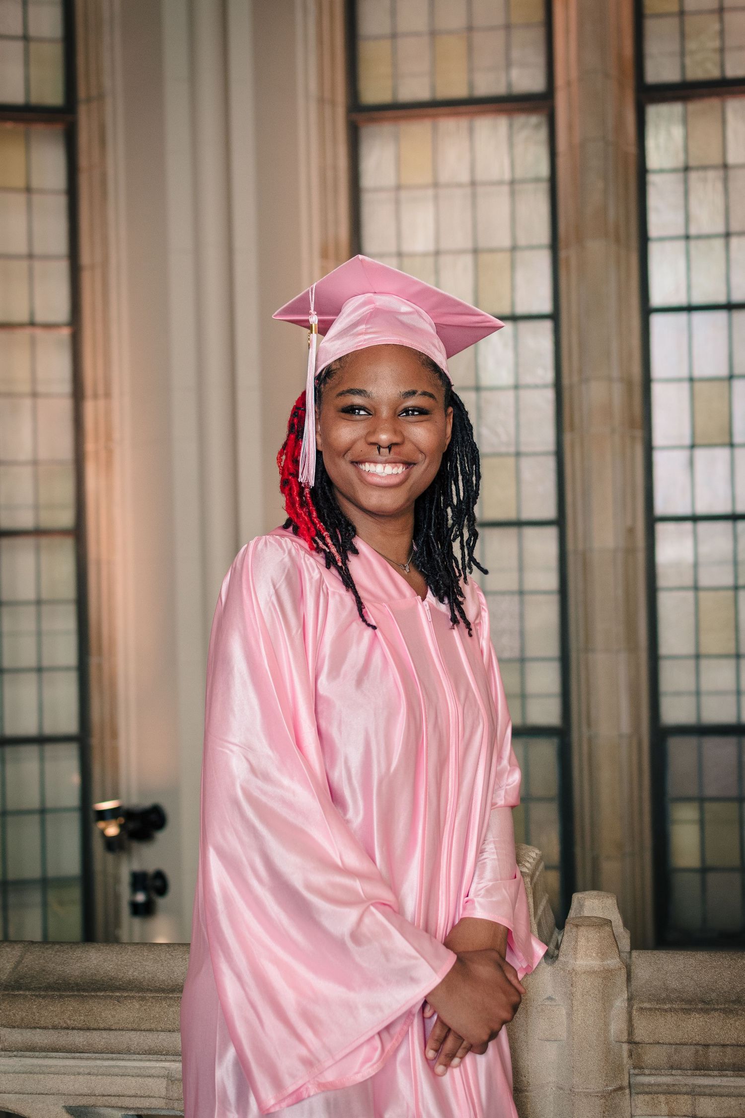 Seattle senior, picture class of 2026, graduation cap and gown photo session UW library.