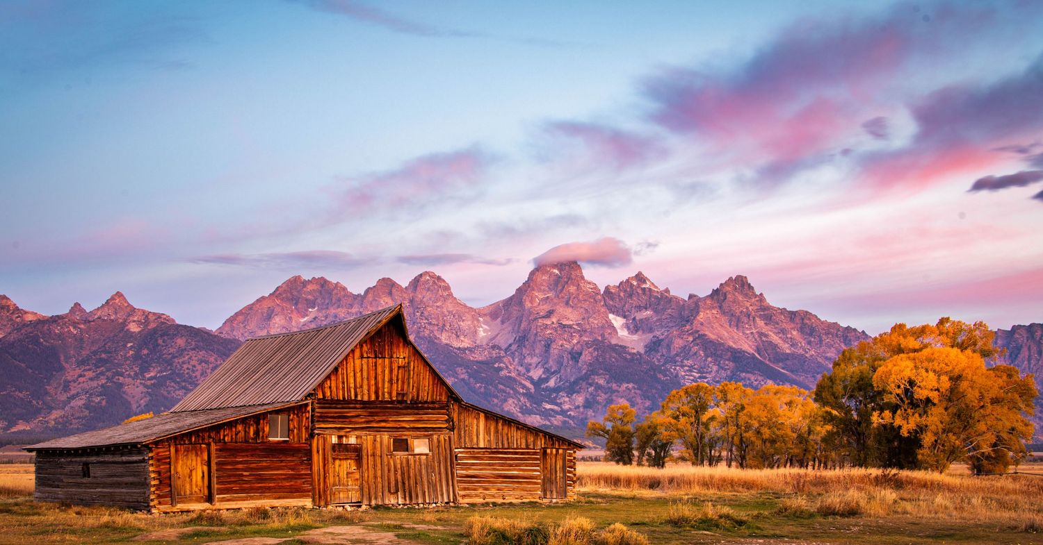 A row of six scenic landscape photos showing mountains, barns, and colorful sunset skies in Grand Teton National Park.
