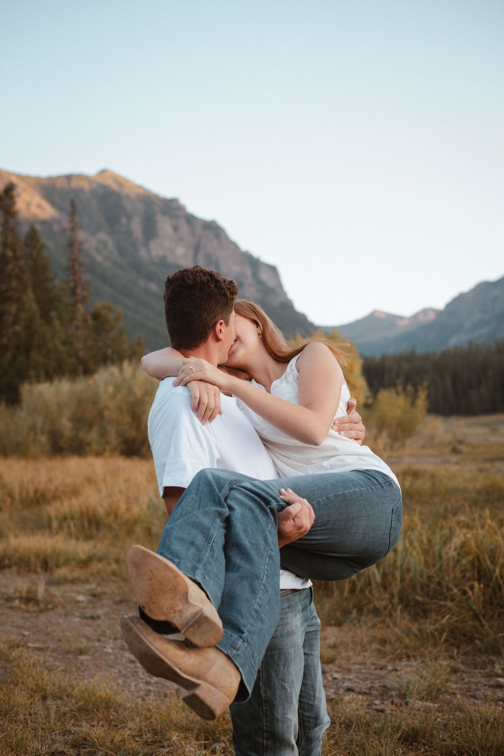 A romantic sequence of dance moves in a mountain meadow at sunset.