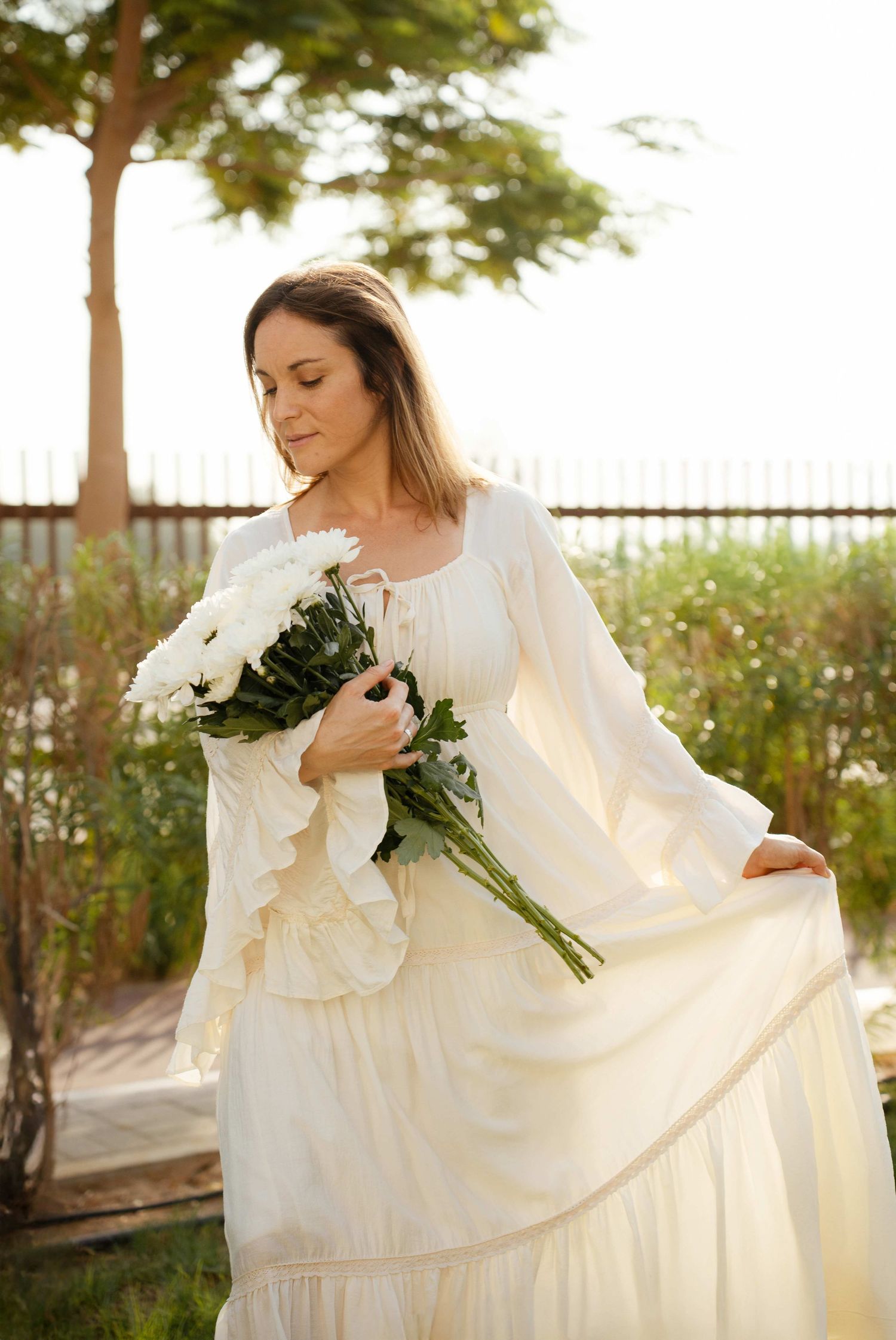 park photoshoot in abu dhabi clinet closet options cream dress white
